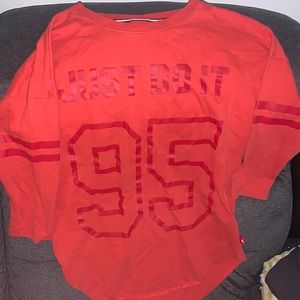 orange nike shirt